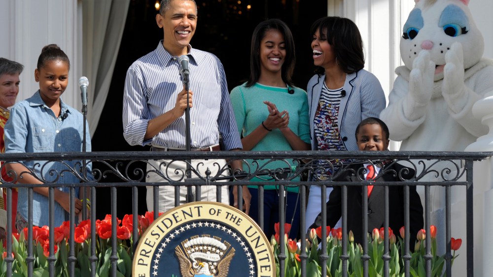 President Obama, accompanied by Michelle Obama, daughters Sasha and Malia, the Easter Bunny and Robby Novak, the Kid President, speak to the crowd during the annual Easter Egg Roll. (AP Photo/Susan Walsh)