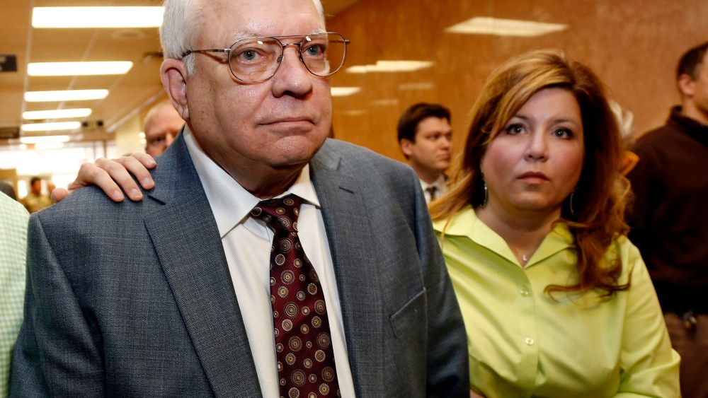 Robert Bates, left, leaves his arraignment with his daughter, Leslie McCreary, right, in Tulsa, Okla., on April 21, 2015. (Photo by Sue Ogrocki/AP)