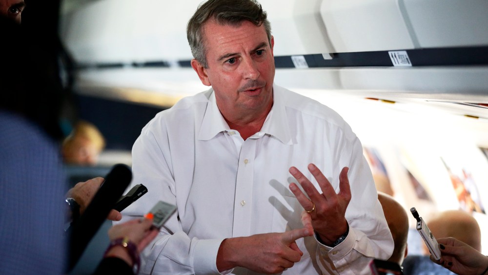 Senior adviser Ed Gillespie briefs reporters as they accompany Mitt Romney to Weyers Cave, Va., Thursday, Oct. 4, 2012.
