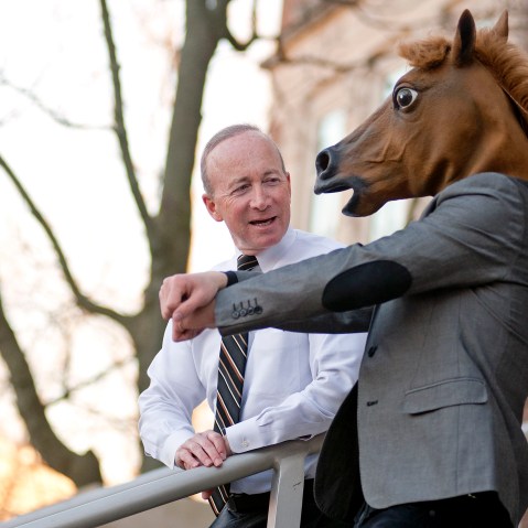 Purdue president Mitch Daniels is welcomed to campus by Won Suk Yi, a junior in aeronautical engineering, with a surprise Gangnam Style flashmob on the steps of Hovde Hall, in West Lafayette, Ind., Thursday, Jan. 17, 2013. (AP Photo/Journal &...