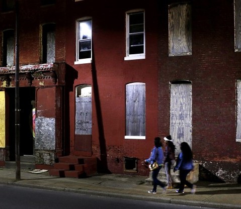 Baltimore is just one of the cities suffering with near-record levels of poverty. (Photo by Patrick Semansky/AP Photo)