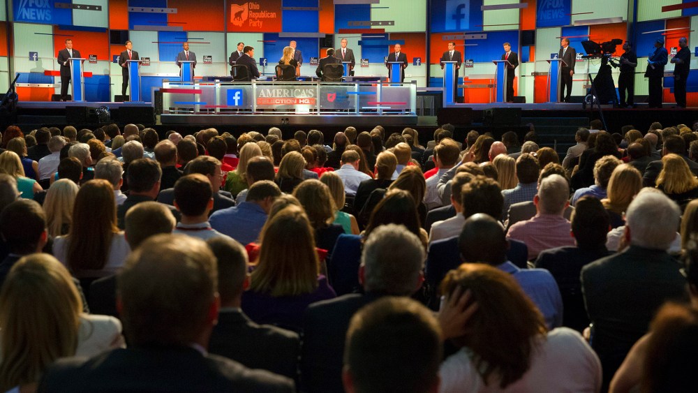 Republican presidential candidates take the stage for the first Republican presidential debate at the Quicken Loans Arena, Aug. 6, 2015, in Cleveland. (Photo by John Minchillo/AP)