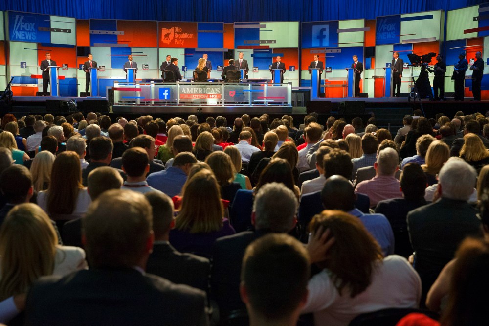 Republican presidential candidates take the stage for the first Republican presidential debate at the Quicken Loans Arena, Aug. 6, 2015, in Cleveland. (Photo by John Minchillo/AP)