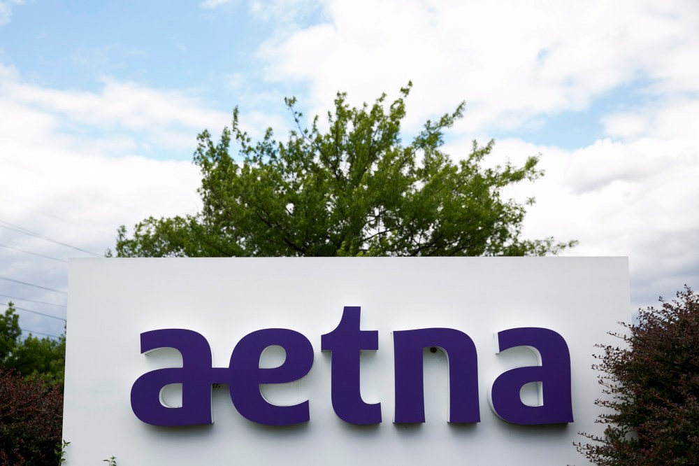 A logo sign outside of a facility occupied by Aetna, Inc., in Blue Bell, Penn., on June 28, 2015. (Photo by Kristoffer Tripplaar/AP)
