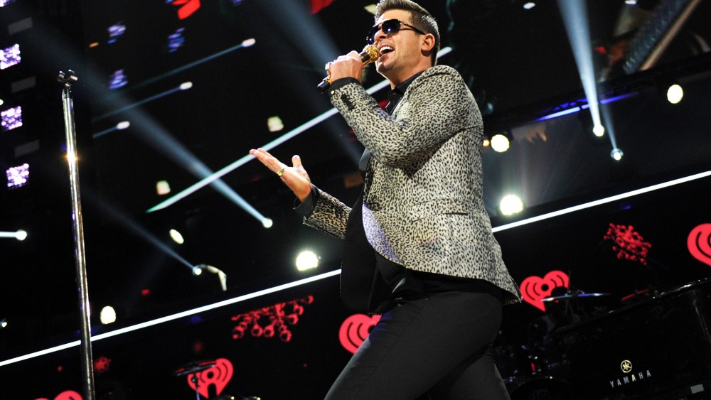 This Dec. 13, 2013 file photo shows Robin Thicke performing at Madison Square Garden in New York, N.Y. (Photo by Evan Agostini/Invision/AP)