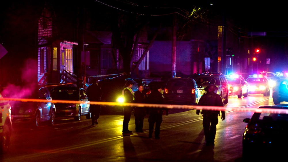 Madison Police investigate the scene of a shooting on Williamson Street on March 6, 2015 in Madison, Wis. (Photo by Steve Apps/Wisconsin State Journal/AP)