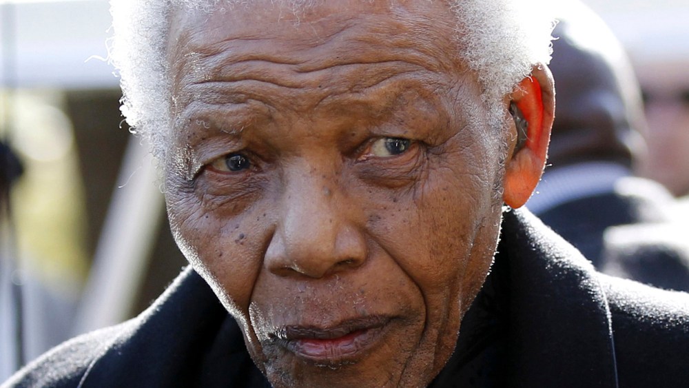 In this June 17, 2010 file photo, former South African President Nelson Mandela leaves the chapel after attending the funeral of his great-granddaughter Zenani Mandela in Johannesburg, South Africa. (Photo by Siphiwe Sibeko/AP Photo, Pool, File)