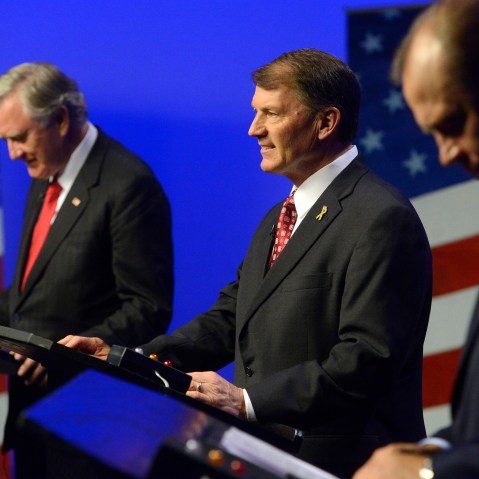 Independent candidate, Larry Pressler, left, Republican candidate, Mike Rounds, center and Democratic candidate Rick Weiland prepare before a televised U.S. Senate candidate debate Thursday night, on Oct. 23, 2014 in Vermillion, S.D.