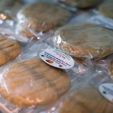 Cannabis-infused peanut butter cookies are displayed for sale at a Weeds Glass & Gifts medical marijuana dispensary in downtown Vancouver, B.C., May 1, 2015. (Photo by Darryl Dyck/The Canadian Press/AP)