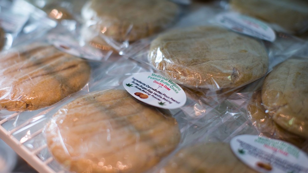 Cannabis-infused peanut butter cookies are displayed for sale at a Weeds Glass & Gifts medical marijuana dispensary in downtown Vancouver, B.C., May 1, 2015. (Photo by Darryl Dyck/The Canadian Press/AP)