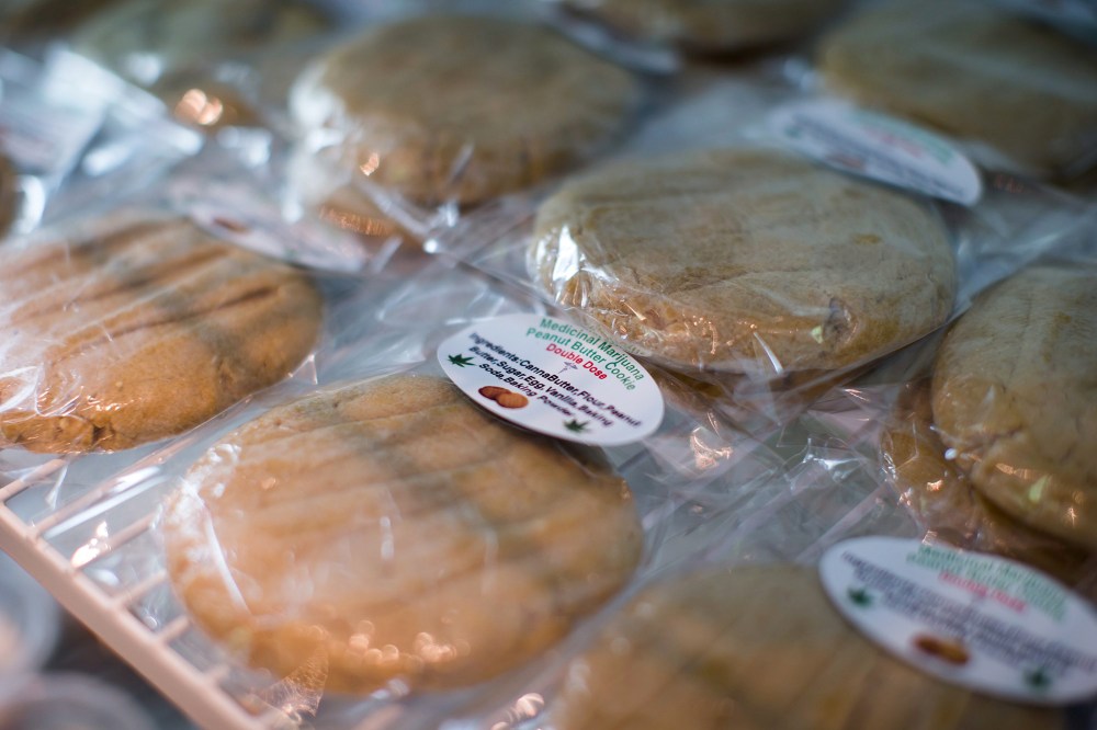 Cannabis-infused peanut butter cookies are displayed for sale at a Weeds Glass & Gifts medical marijuana dispensary in downtown Vancouver, B.C., May 1, 2015. (Photo by Darryl Dyck/The Canadian Press/AP)