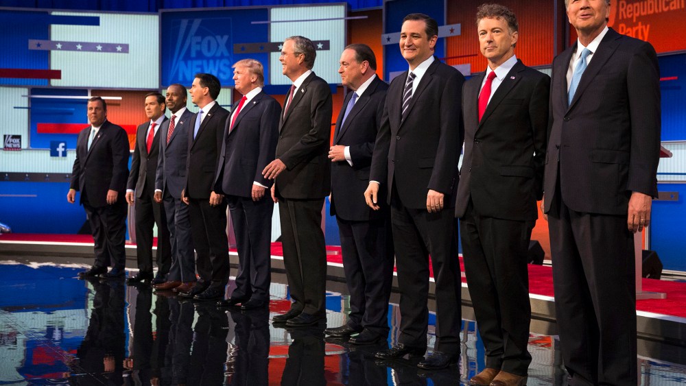 Republican presidential candidates take the stage for the first Republican presidential debate at the Quicken Loans Arena, Aug. 6, 2015, in Cleveland. (Photo by John Minchillo/AP)