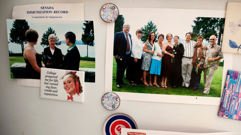 Sara Geiger and Megan Lanz's wedding photos from their ceremony in Canada are seen on their refrigerator door in Las Vegas, April 29, 2012.