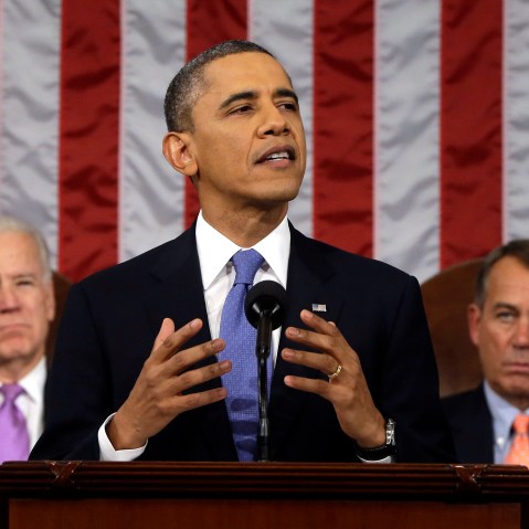 President Barack Obama, flanked by Vice President Joe Biden and House Speaker John Boehner of Ohio, gestures as State of the Union address during a jointhe gives his session of Congress on Capitol Hill in Washington, Tuesday Feb. 12, 2013. (Photo by AP...