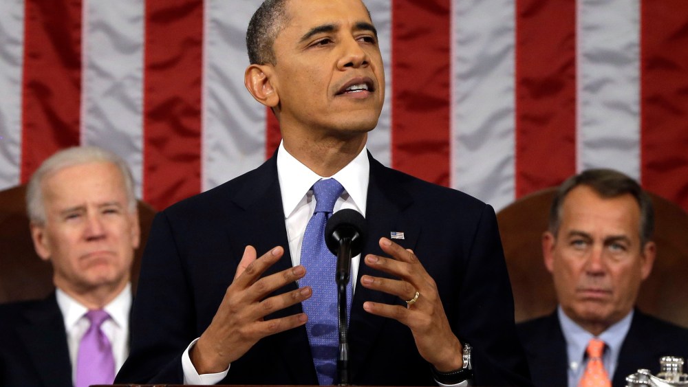 President Barack Obama, flanked by Vice President Joe Biden and House Speaker John Boehner of Ohio, gestures as State of the Union address during a jointhe gives his session of Congress on Capitol Hill in Washington, Tuesday Feb. 12, 2013. (Photo by AP...