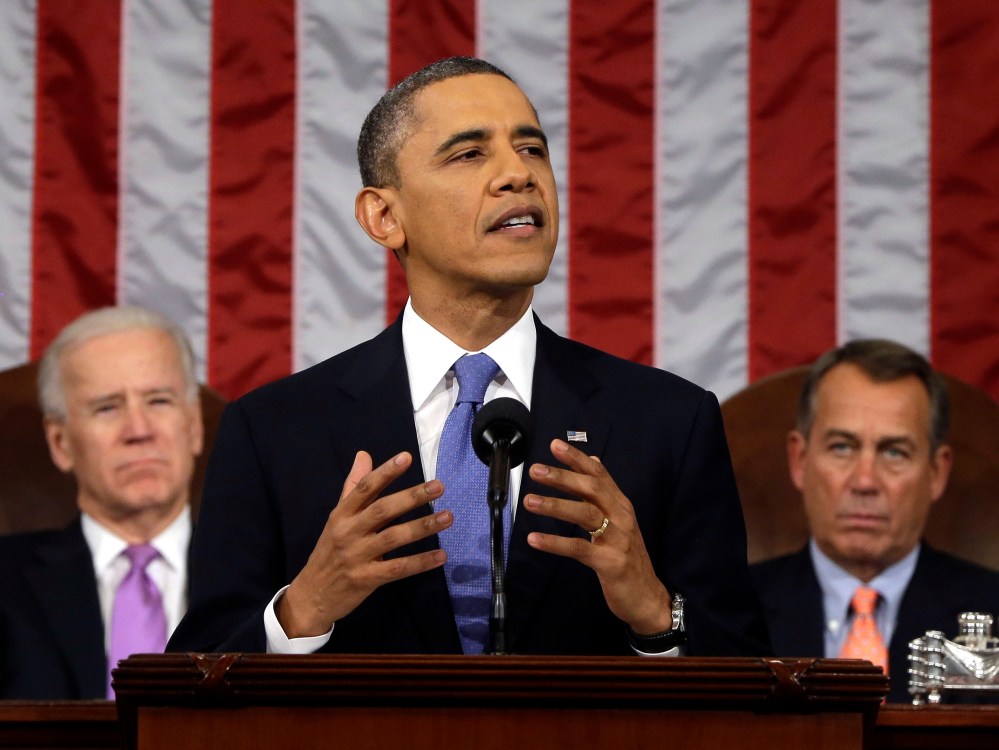 President Barack Obama, flanked by Vice President Joe Biden and House Speaker John Boehner of Ohio, gestures as State of the Union address during a jointhe gives his session of Congress on Capitol Hill in Washington, Tuesday Feb. 12, 2013. (Photo by AP...