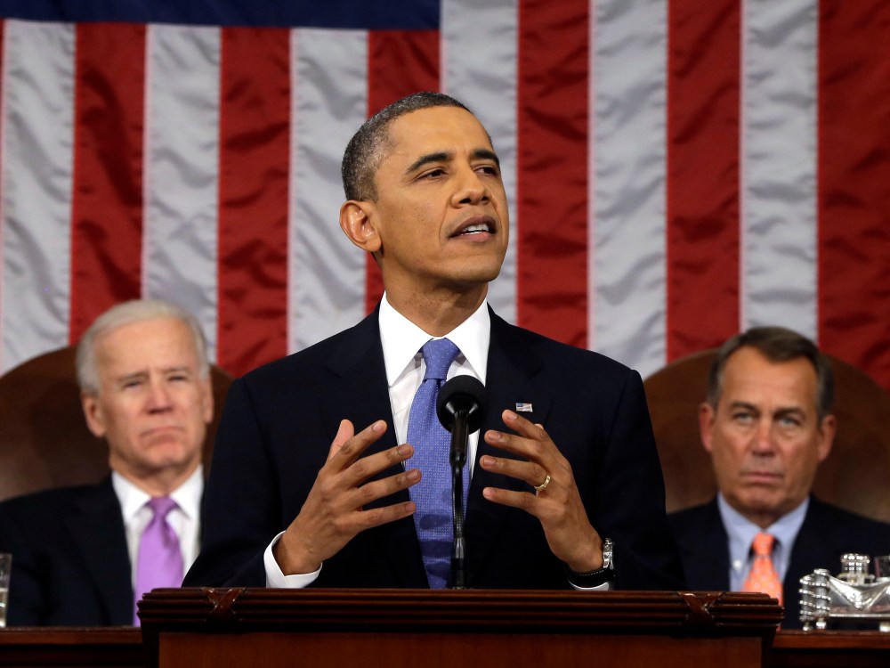 President Barack Obama, flanked by Vice President Joe Biden and House Speaker John Boehner of Ohio, gestures as State of the Union address during a jointhe gives his session of Congress on Capitol Hill in Washington, Tuesday Feb. 12, 2013. (Photo by AP...