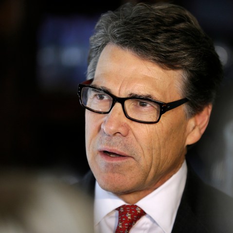 Texas Gov. Rick Perry speaks to reporters following an event, May 29, 2014, in Ames, Iowa.