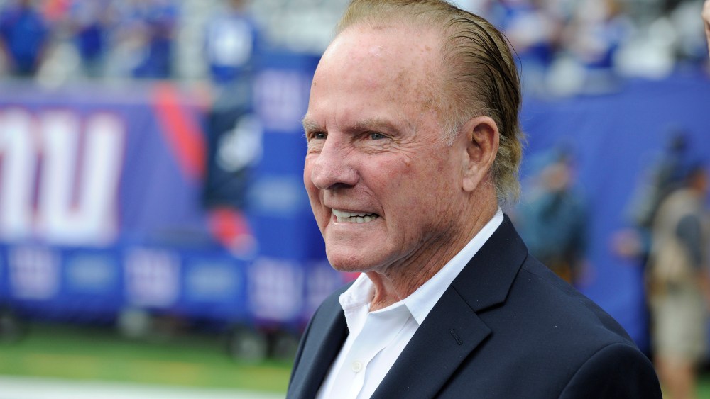 Former New York Giants player Frank Gifford looks on before an NFL football game between the New York Giants and the Denver Broncos, Sept. 15, 2013, in East Rutherford, N.J. (Photo by Bill Kostroun/AP)