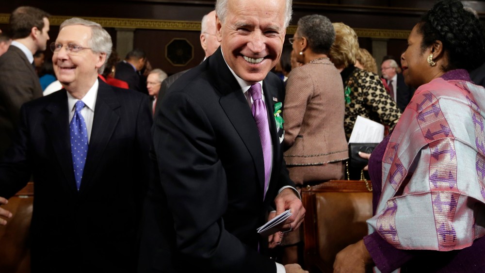 Vice President Joe Biden, Senate Minority Leader Mitch McConnell of Ky., left, Rep. Shelia Jackson Lee, D-Texas, right, and others arrive on Capitol Hill in Washington, Tuesday, Feb. 12, 2103, for President Barack Obama's State of the Union address...