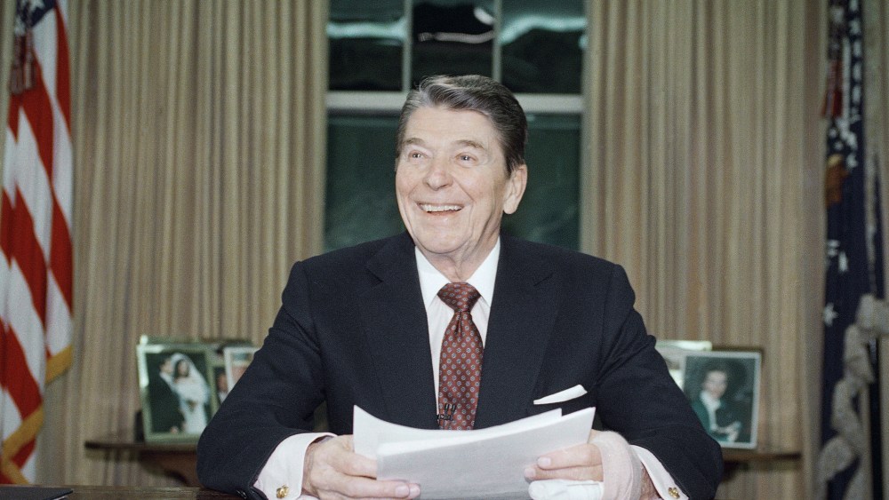 President Ronald Reagan poses for photographers in the Oval Office, Jan. 11, 1989 after delivering a televised farewell address to the nation.