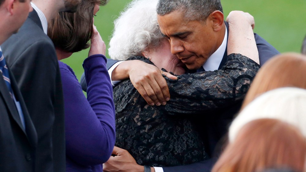 Barack Obama Comforts Family- Navy Yard- 09/22/13