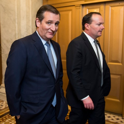 Presidential candidate Sen. Ted Cruz speaks with Sen. Mike Lee, R-Utah, as they leave the Senate floor following the cloture vote on the "American Security Against Foreign Enemies Act of 2015" on Jan. 20, 2016. (Photo By Bill Clark/CQ Roll Call/AP)