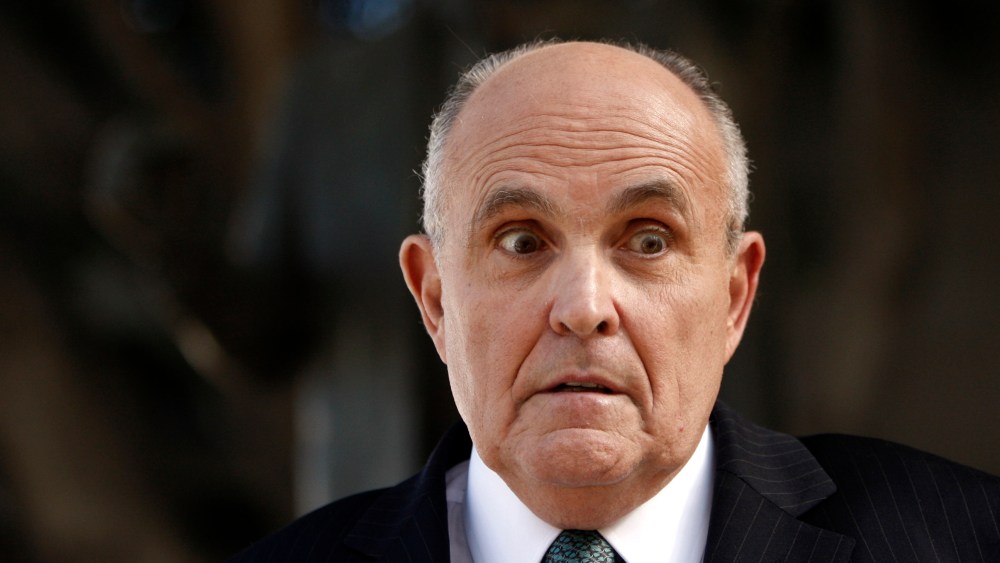 Lawyer and former New York City Mayor Rudy Giuliani at a press conference after appearing in court to call for the dismissal of a lawsuit filed against video game giant Activision in Los Angeles, Calif., Oct. 16, 2014. (Photo by Damian Dovarganes/AP)