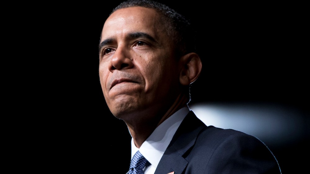 President Barack Obama pauses while speaking at the LBJ Presidential Library during the Civil Rights Summit to commemorate the 50th anniversary of the signing of the Civil Rights Act, April 10, 2014, in Austin, Texas.