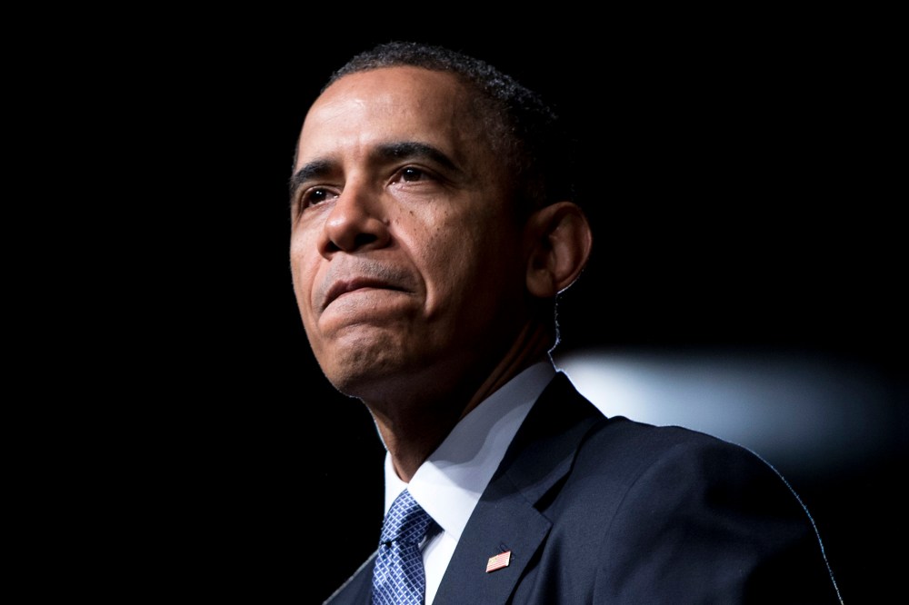 President Barack Obama pauses while speaking at the LBJ Presidential Library during the Civil Rights Summit to commemorate the 50th anniversary of the signing of the Civil Rights Act, April 10, 2014, in Austin, Texas.