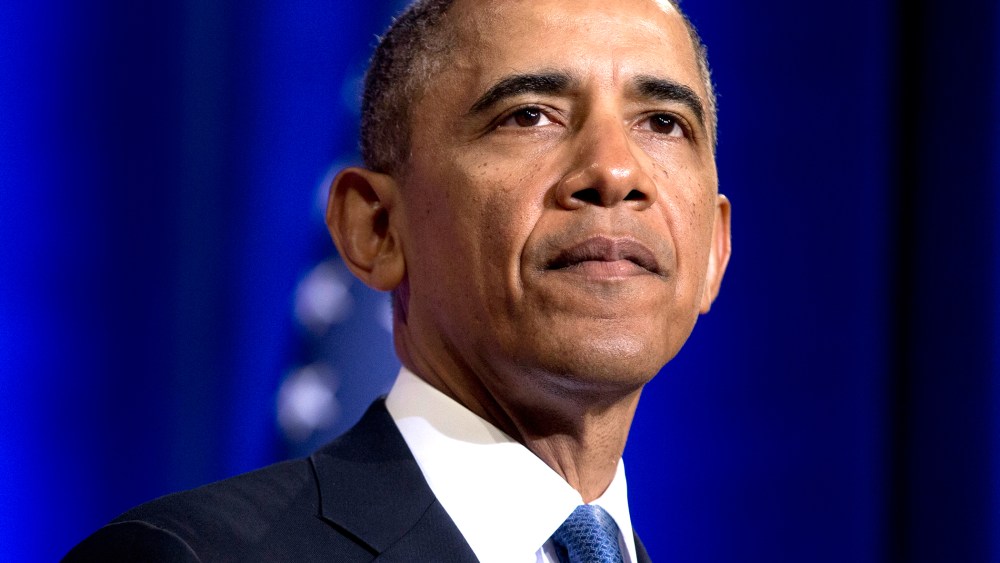 President Barack Obama pauses while talking, Jan. 17, 2014, in Washington.