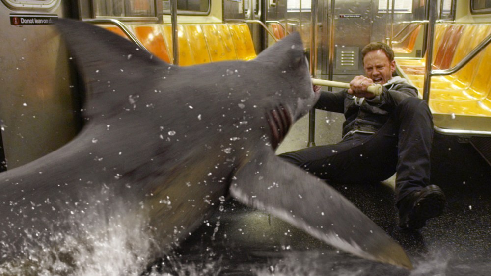In this image released by Syfy, Ian Ziering, as Fin Shepard battles a shark on a New York City subway in a scene from "Sharknado 2: The Second One.