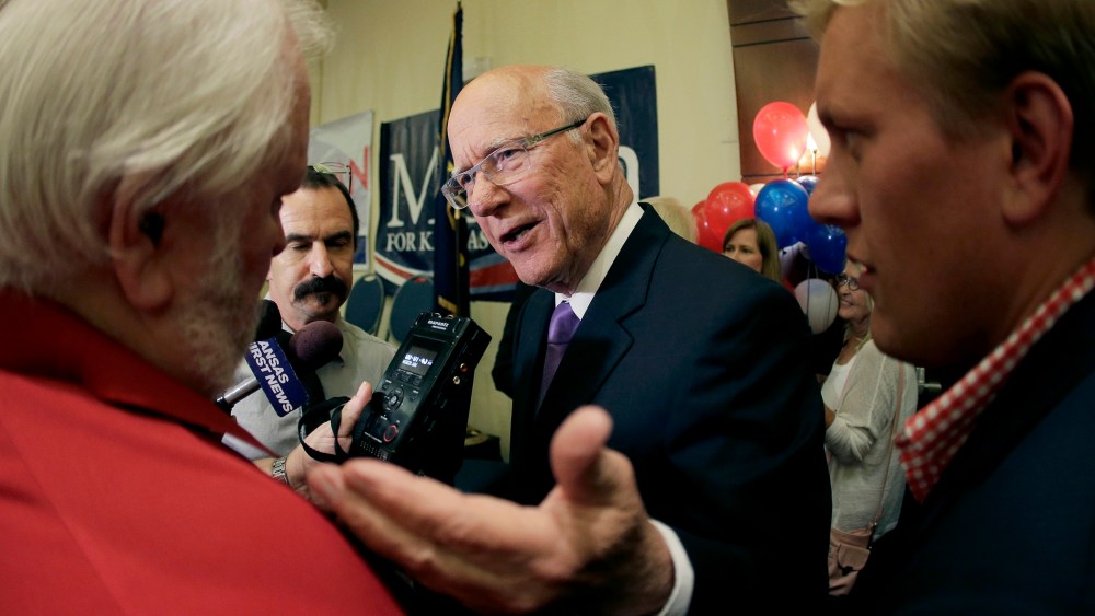 U.S. Sen. Pat Roberts talks to the media after making his victory speech at an election watch party, Aug. 5, 2014, in Overland Park, Kan.