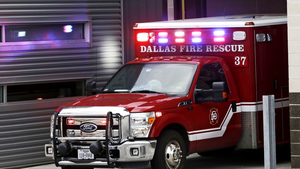 An ambulance pulls into the Dallas Fire-Rescue station 37 in Dallas, Wednesday, Oct. 1, 2014.
