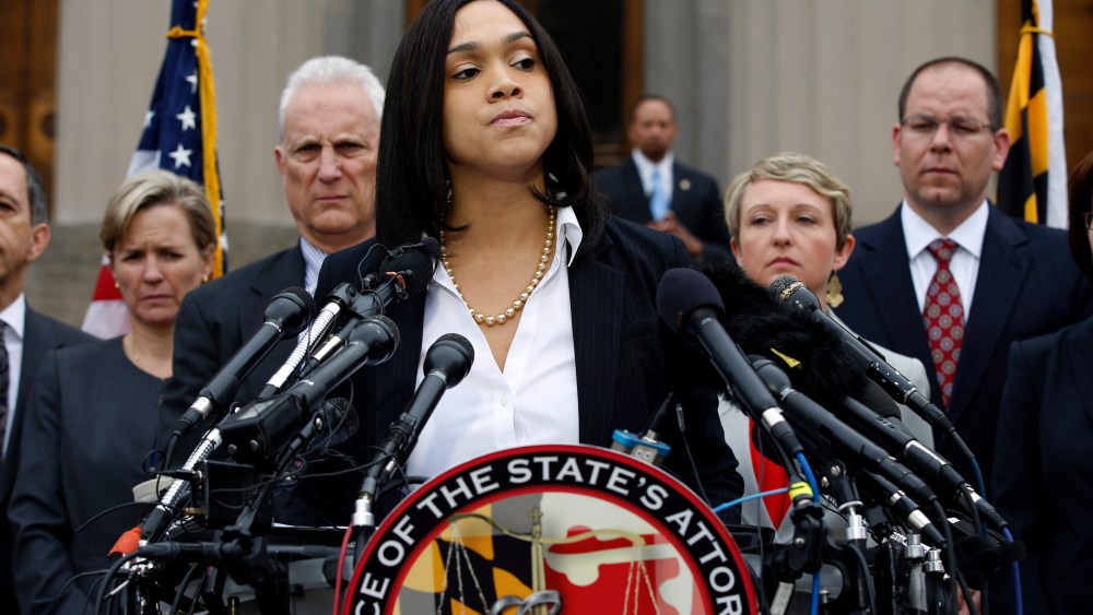 Marilyn Mosby, Baltimore state's attorney, pauses while announcing criminal charges against all six officers suspended after Freddie Gray suffered a fatal spinal injury in police custody, May 1, 2015 in Baltimore, Md. (Photo by Alex Brandon/AP)