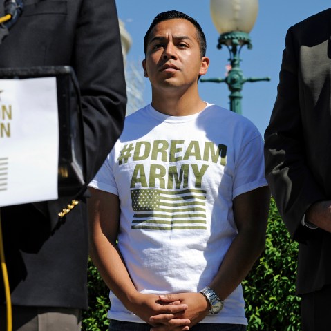 DREAM Action Coalition Co-Director Cesar Vargas, center, participates in a news conference on Capitol Hill in Washington, D.C., July 25, 2014. (Photo by AP)