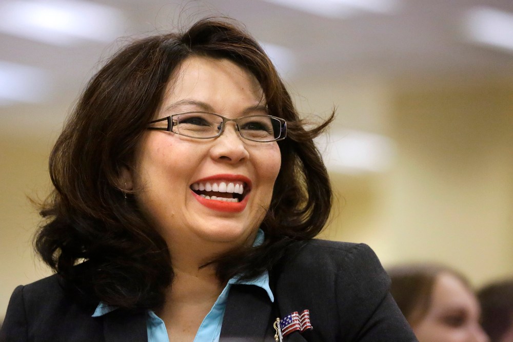 In this Aug. 13, 2014 file photo, U.S. Rep. Tammy Duckworth, D-Ill., appears at annual state fair Governor's Day brunch in Springfield, Ill. (Photo by Seth Perlman/AP)