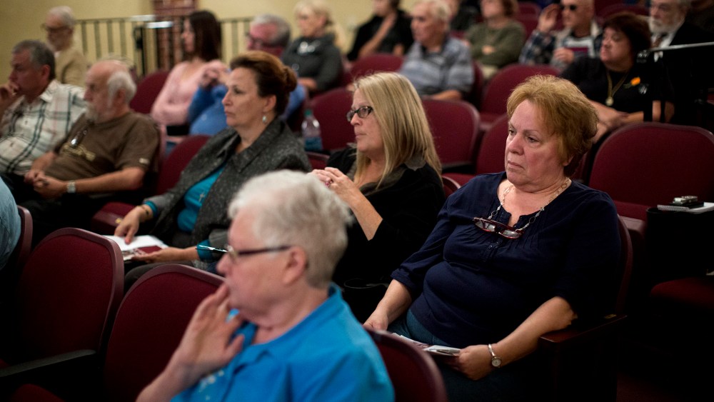 Audience members listen during a federal health care law informational town hall meeting with Rep. Matt Cartwright, D-Pa., Nov. 1, 2013, in Pottsville, Pa.