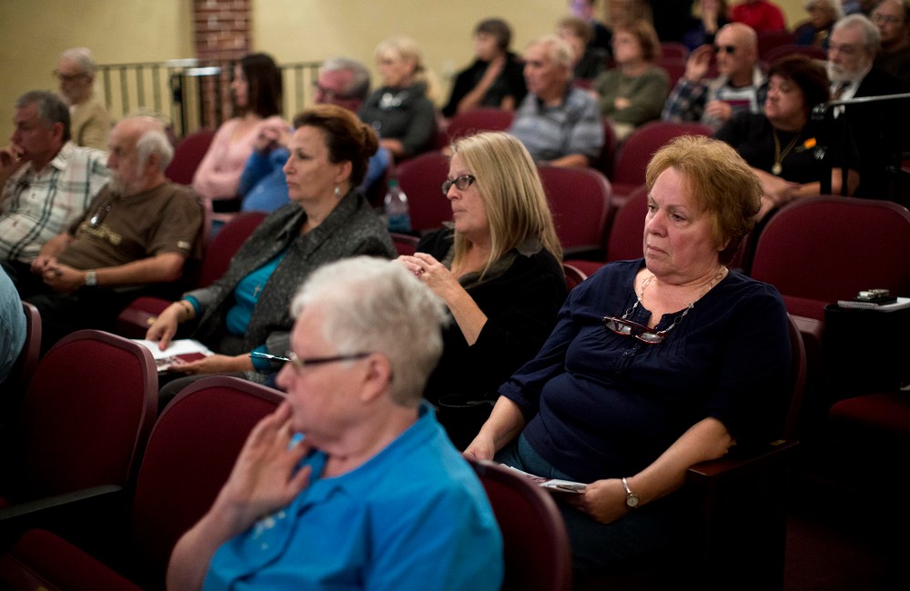 Audience members listen during a federal health care law informational town hall meeting with Rep. Matt Cartwright, D-Pa., Nov. 1, 2013, in Pottsville, Pa.