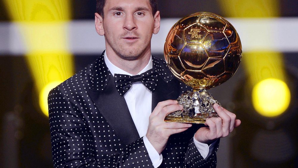 FC Barcelona's Argentinian striker Lionel Messi poses with the trophy after being awarded the FIFA Men's World Player of the Year during the FIFA Ballon d'Or Gala 2012 held at the Kongresshaus in Zurich, Switzerland, Monday,  Jan 7, 2013. Messi was...