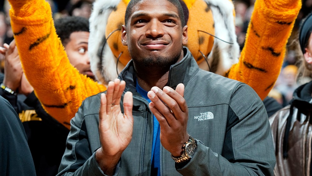 Missouri's All-American defensive end Michael Sam claps during the Cotton Bowl trophy presentation, Feb. 15, 2014, in Columbia, Mo.