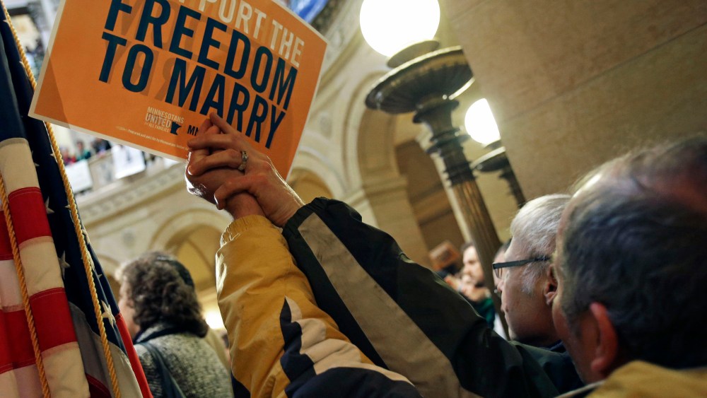 File Photo: In this Feb. 14, 2013 file photo supporters of gay marriage call for Minnesota lawmakers to legalize gay marriage at the State Capitol in St. Paul, Minn. Minnesota has a state House vote on gay marriage  Thursday, May 9, 2013, and...
