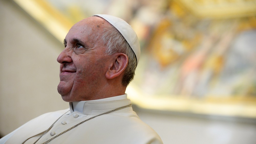 Pope Francis smiles as he meets with Cyprus President Nicos Anastasiades during a private audience in the pontiff's studio, at the Vatican,  Feb. 15, 2014.