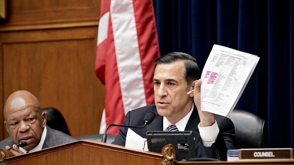 Darrell Issa, R-Calif., holds up a document during a hearing on the problems with implementation of the Obamacare healthcare program on Capitol Hill in Washington, on Nov. 13, 2013.