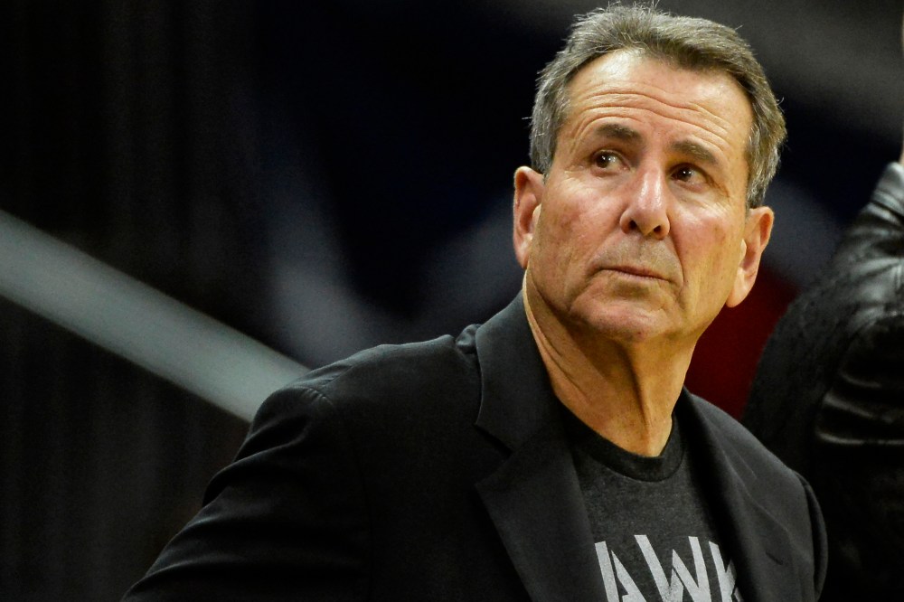 Atlanta Hawks co-owner Bruce Levenson watches from his courtside seat in the second half of their NBA basketball game against the Washington Wizards, Dec. 13, 2013, in Atlanta, Ga.