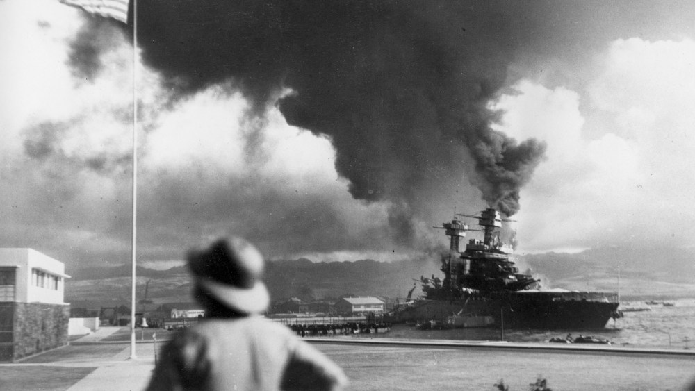 American ships burn during the Japanese attack on Pearl Harbor, Hawaii, on Dec. 7, 1942. (Photo by AP)