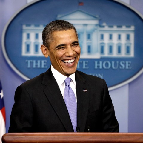President Barack Obama smiles during an end-of-the year news conference in the Brady Press Briefing Room at the White House in Washington, Dec. 20, 2013.