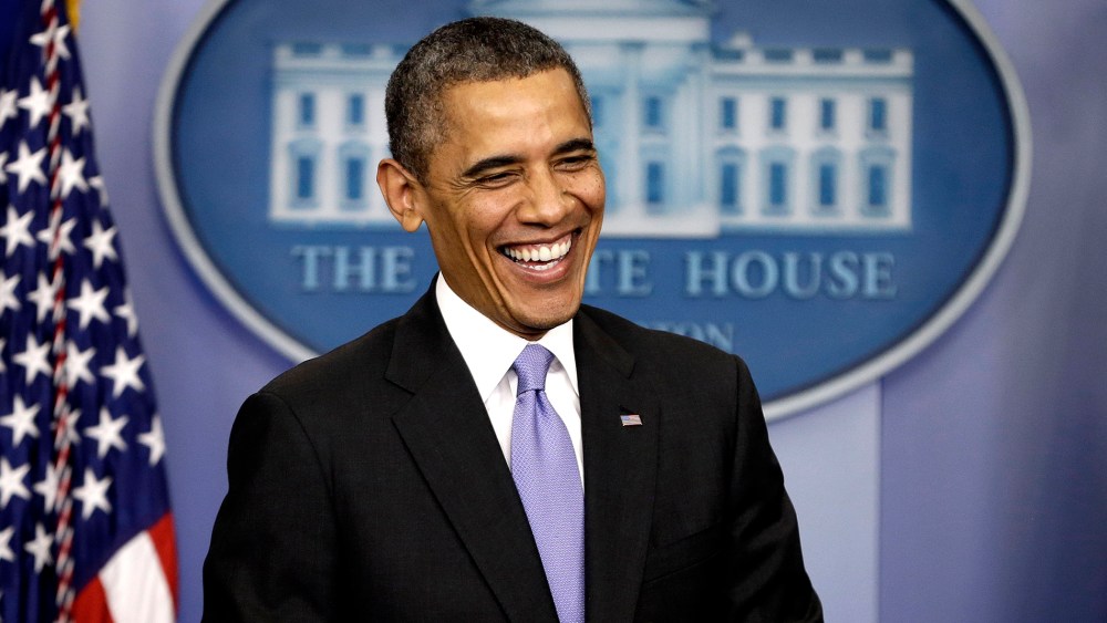 President Barack Obama smiles during an end-of-the year news conference in the Brady Press Briefing Room at the White House in Washington, Dec. 20, 2013.
