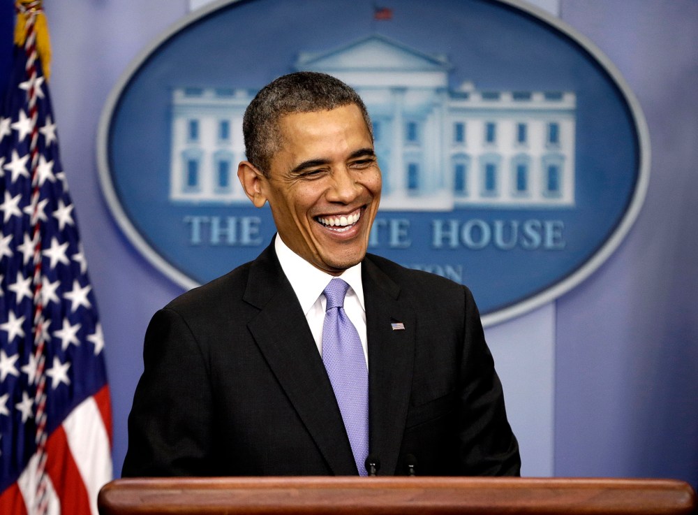 President Barack Obama smiles during an end-of-the year news conference in the Brady Press Briefing Room at the White House in Washington, Dec. 20, 2013.