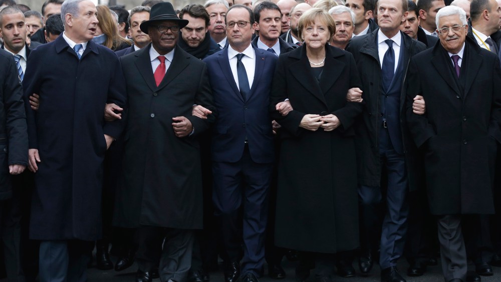 From the left, Israeli Prime Minister Benjamin Netanyahu, Malian President Ibrahim Boubacar Keita, French President Francois Hollande, German Chancellor Angela Merkel, EU president Donald Tusk and Palestinian Authority President Mahmoud Abbas march during
